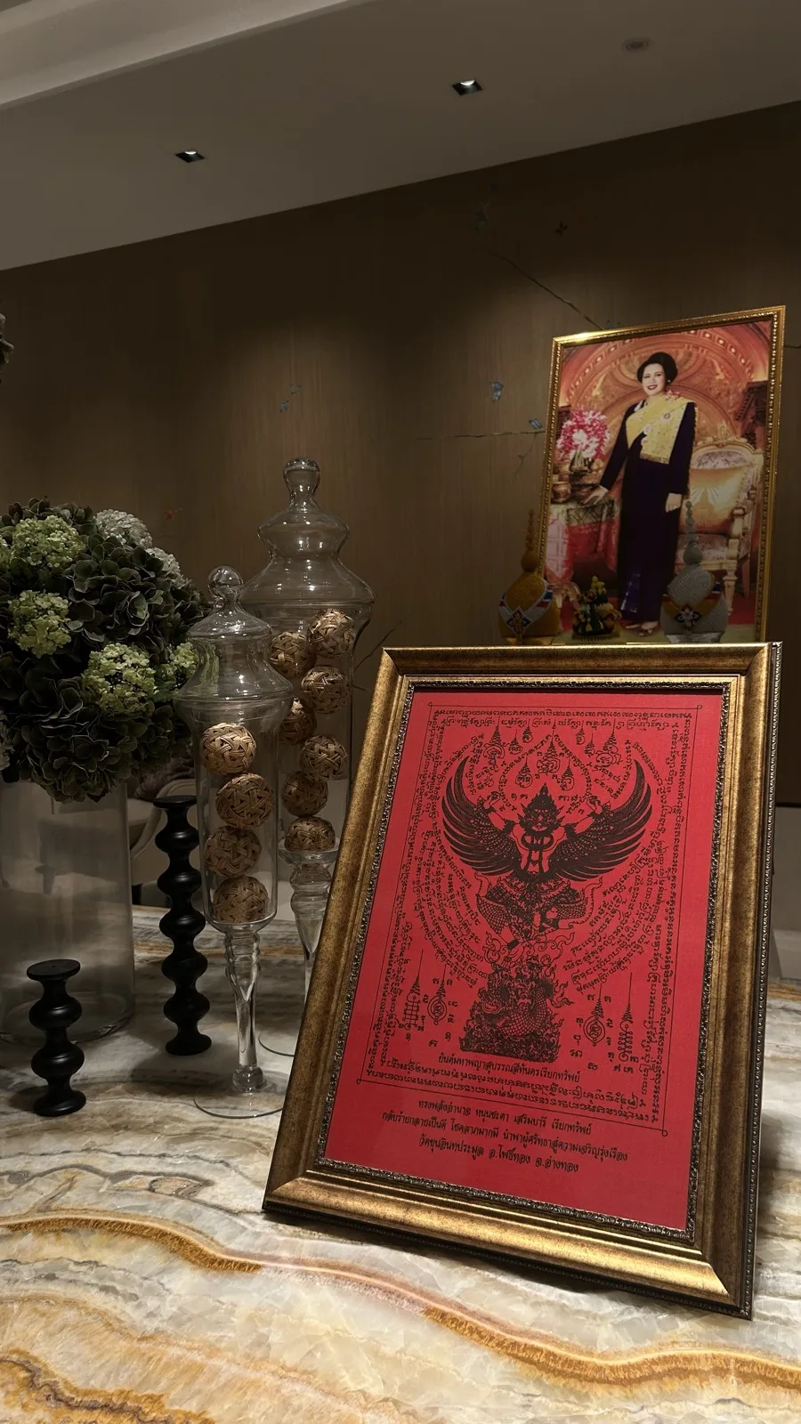 The premium lobby of Hotel Silq in Bangkok with framed Thai artwork