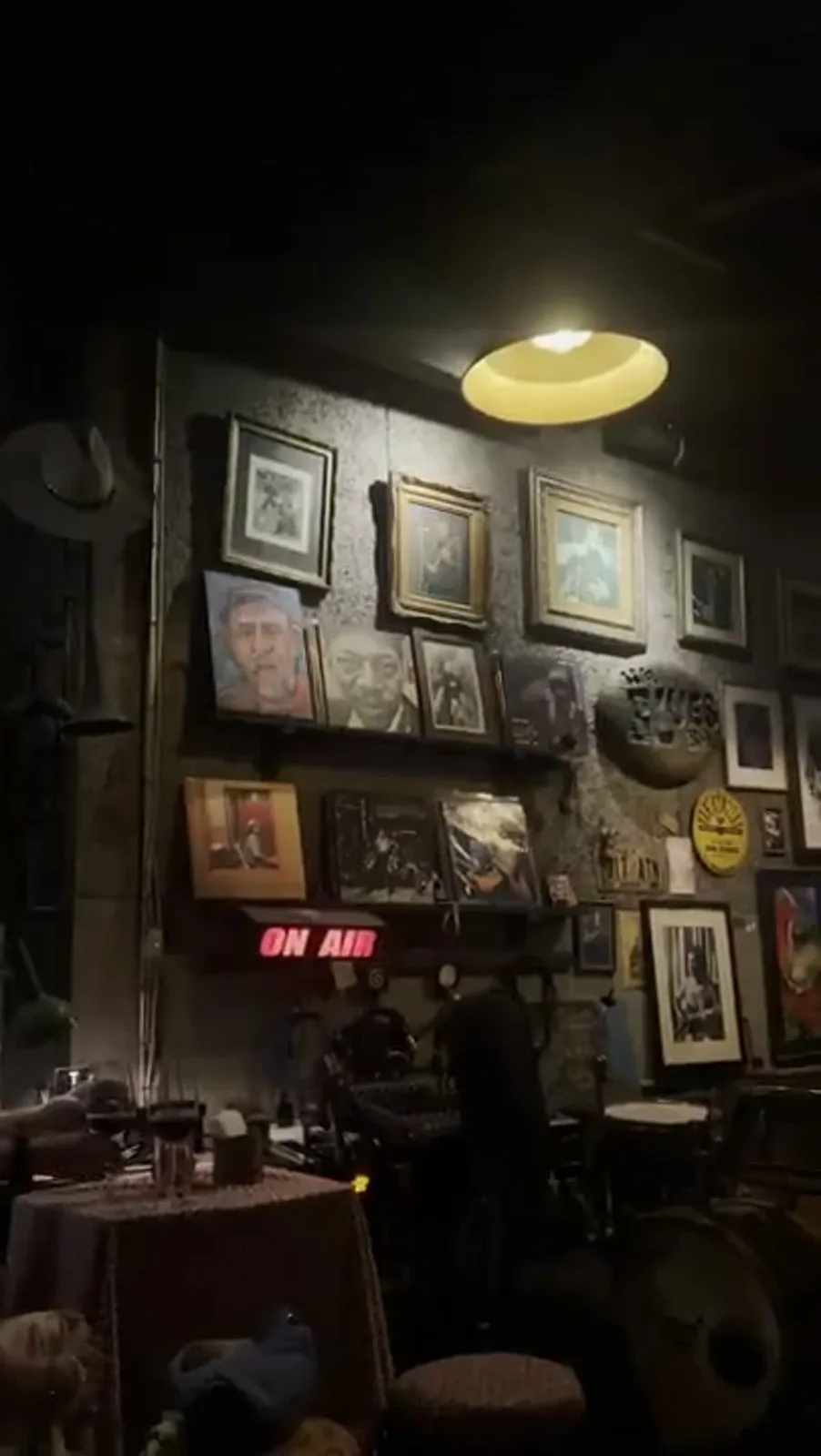 Live blues musicians playing in the dim, intimate Adhere Blues Bar in Bangkok