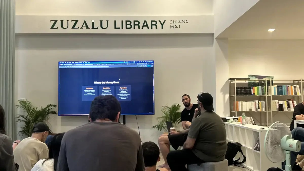 Builders with laptops at the Agents in the Wild event in Zulu Library, Chiang Mai