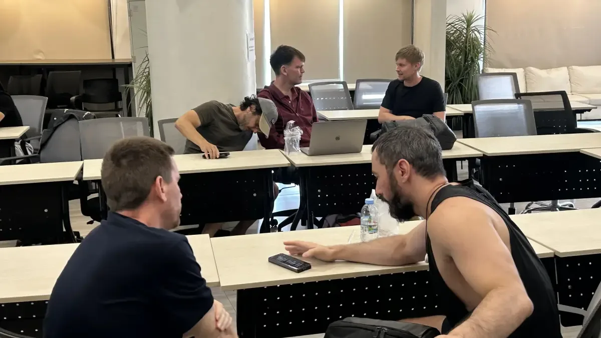 Builders working on laptops at the weekly AI Engineers meetup in Chiang Mai